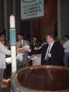 CandleHandoff.jpg (47818 bytes)