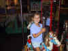 Motya-on-carousel.jpg (58063 bytes)