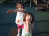 Megan-Colleen-Catching Bubbles.jpg (52327 bytes)