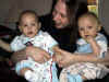 MomwithTwins.jpg (61407 bytes)