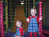 CagedTwins.jpg (111170 bytes)