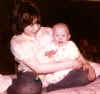 MelissaHoldingCryingBabyRae.jpg (31651 bytes)