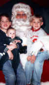 Robbie-Evan-BabyColleen-Santa.jpg (35257 bytes)